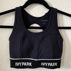 IVY PARK - Mid Impact Logo Tape Racerback Bra